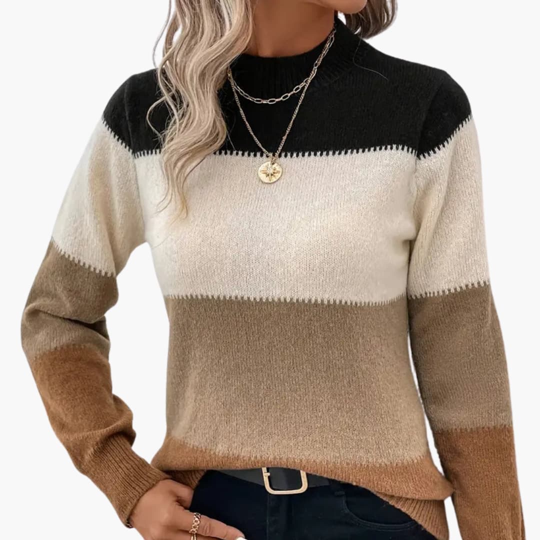 Women's colorblock pullover sweater with round neckline in black, cream, and brown.