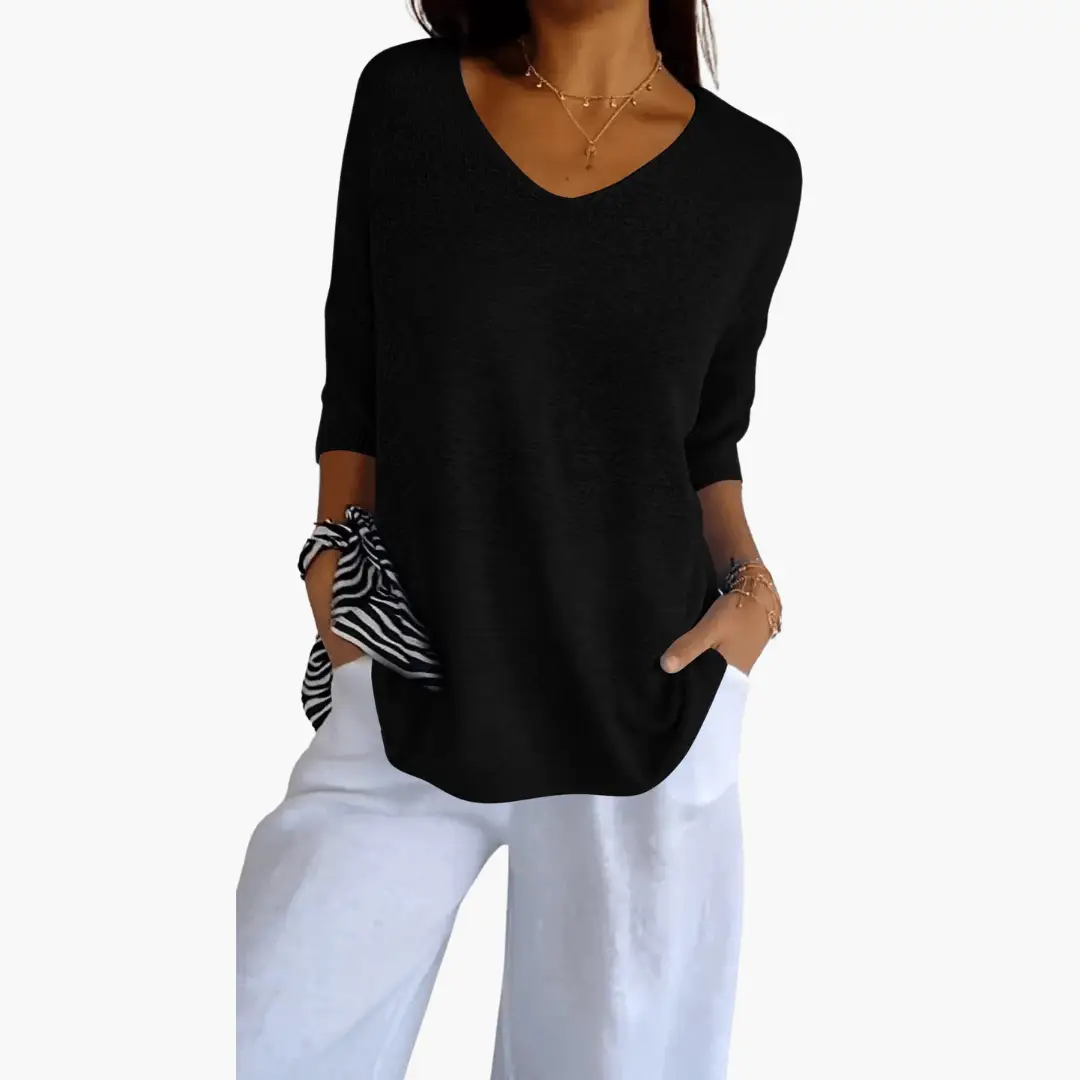 Women's black V-neck loose top by Wilfred Smith for casual summer wear
