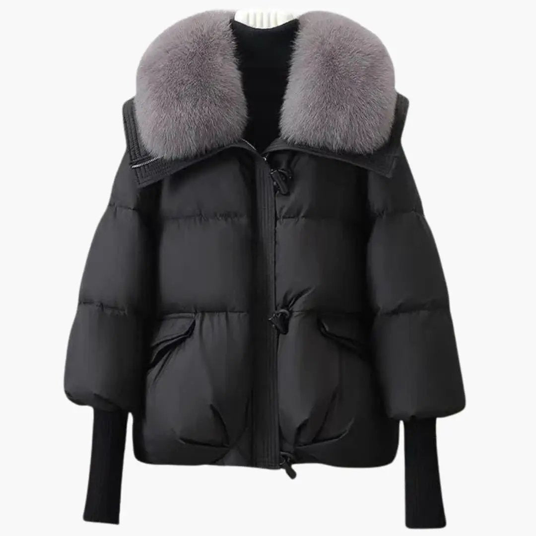 Elegant women's puffer jacket by Wilfred Smith in black with a grey faux fur collar
