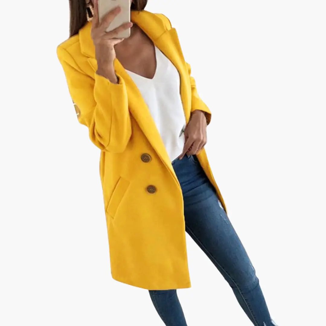 Button Closure Coat for Women in yellow, double-breasted with brown buttons, paired with white top and jeans.