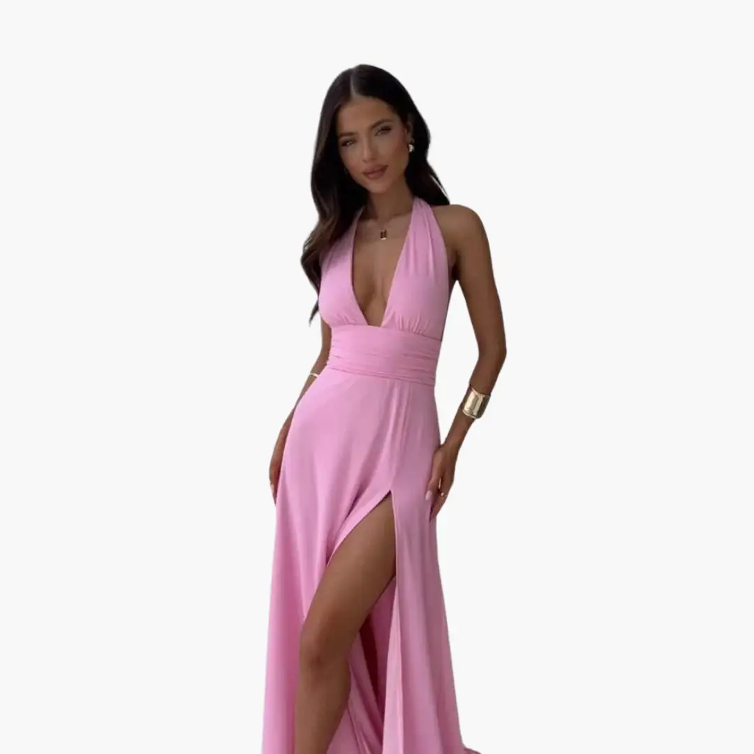 Maxi dress with halter-neck in pink, high-slit evening wear.