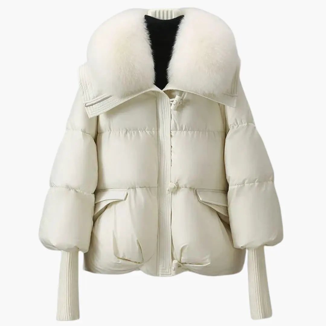 Elegant cream women's puffer jacket with a large plush faux fur collar, front pockets, and an oversized silhouette.