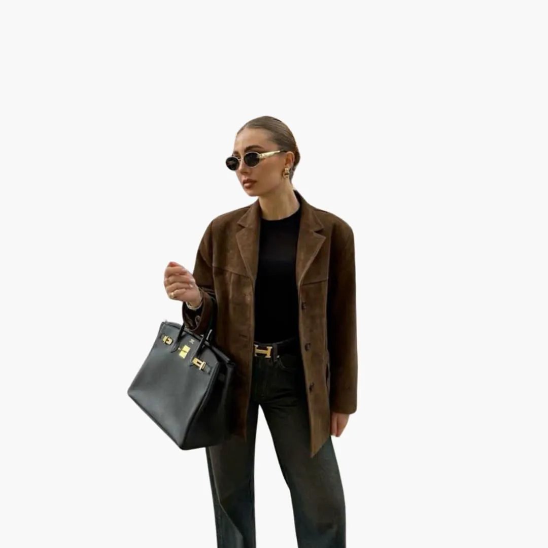 Jackets: Trendy brown suede jacket with button placket by Wilfred Smith, worn over black top with pants and handbag.