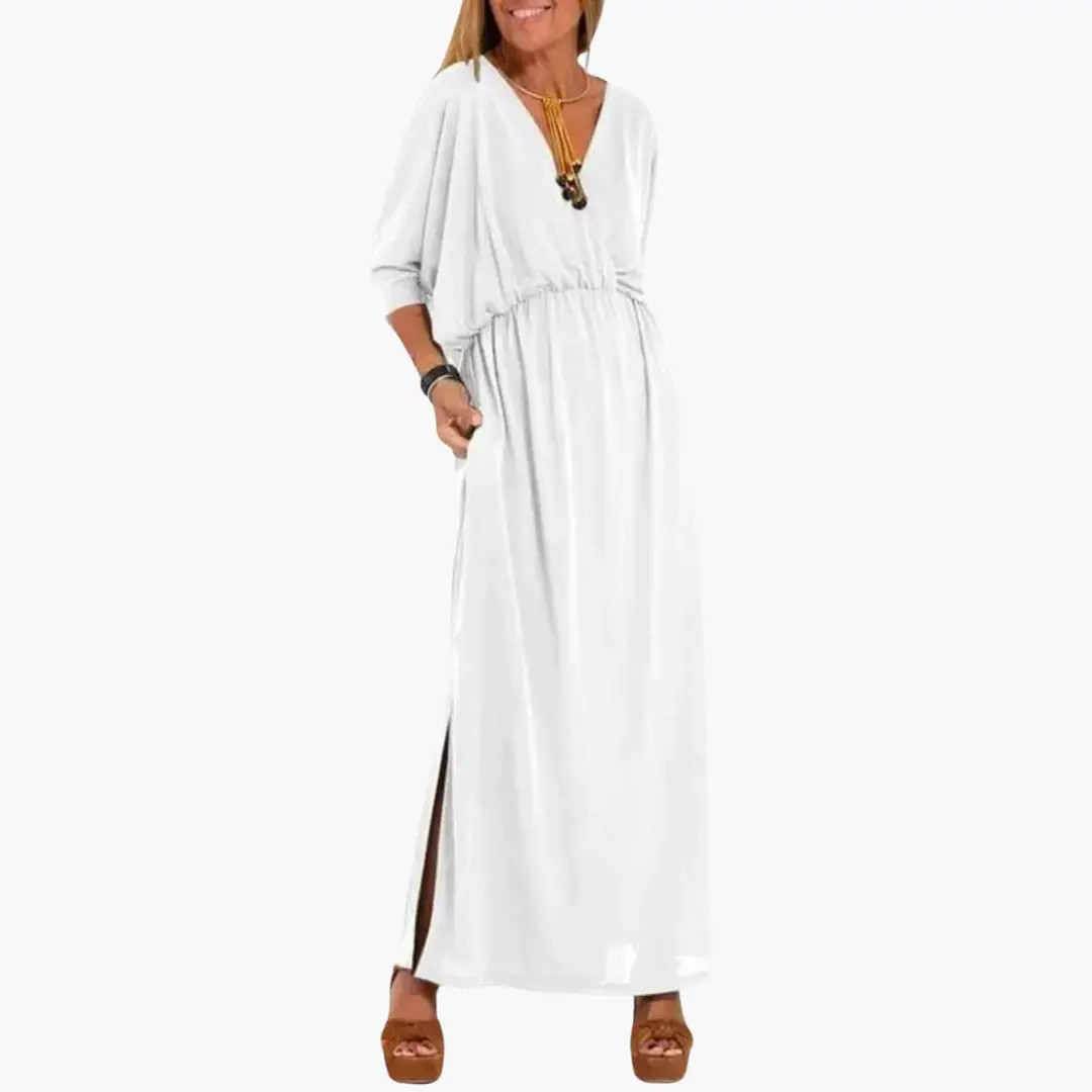 Women's white V-neck maxi dress with 3/4 sleeves and side slit