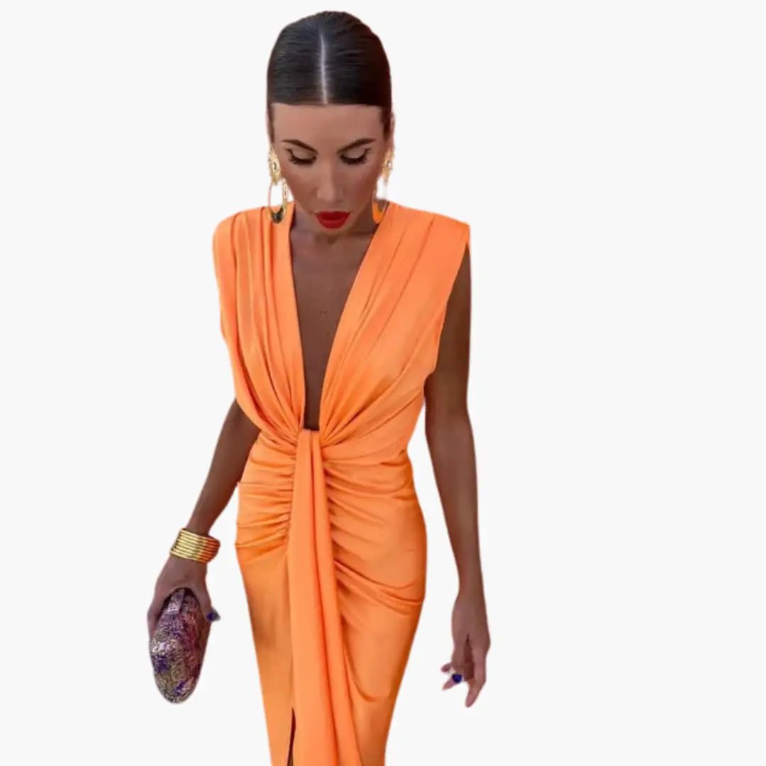 Elegant pleated maxi dress by Wilfred Smith in orange with draped knot waist.