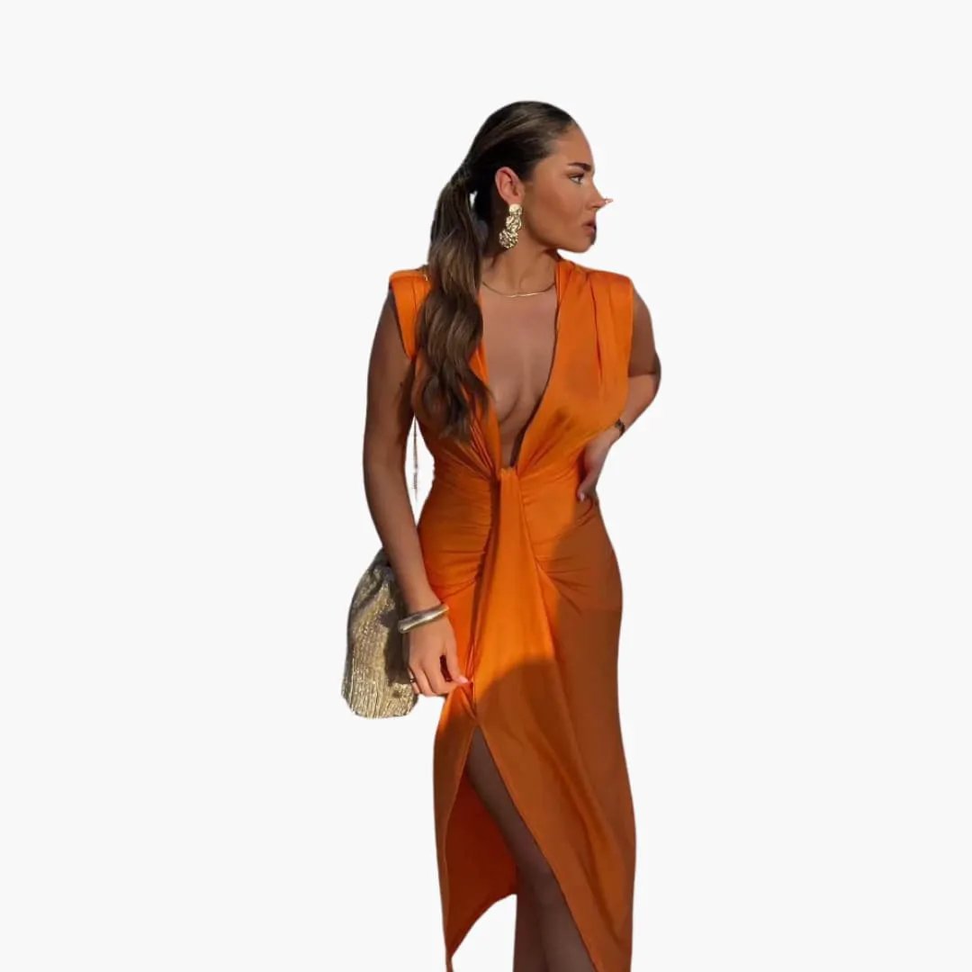 Elegant orange maxi dress with knot at waist and thigh-high slit