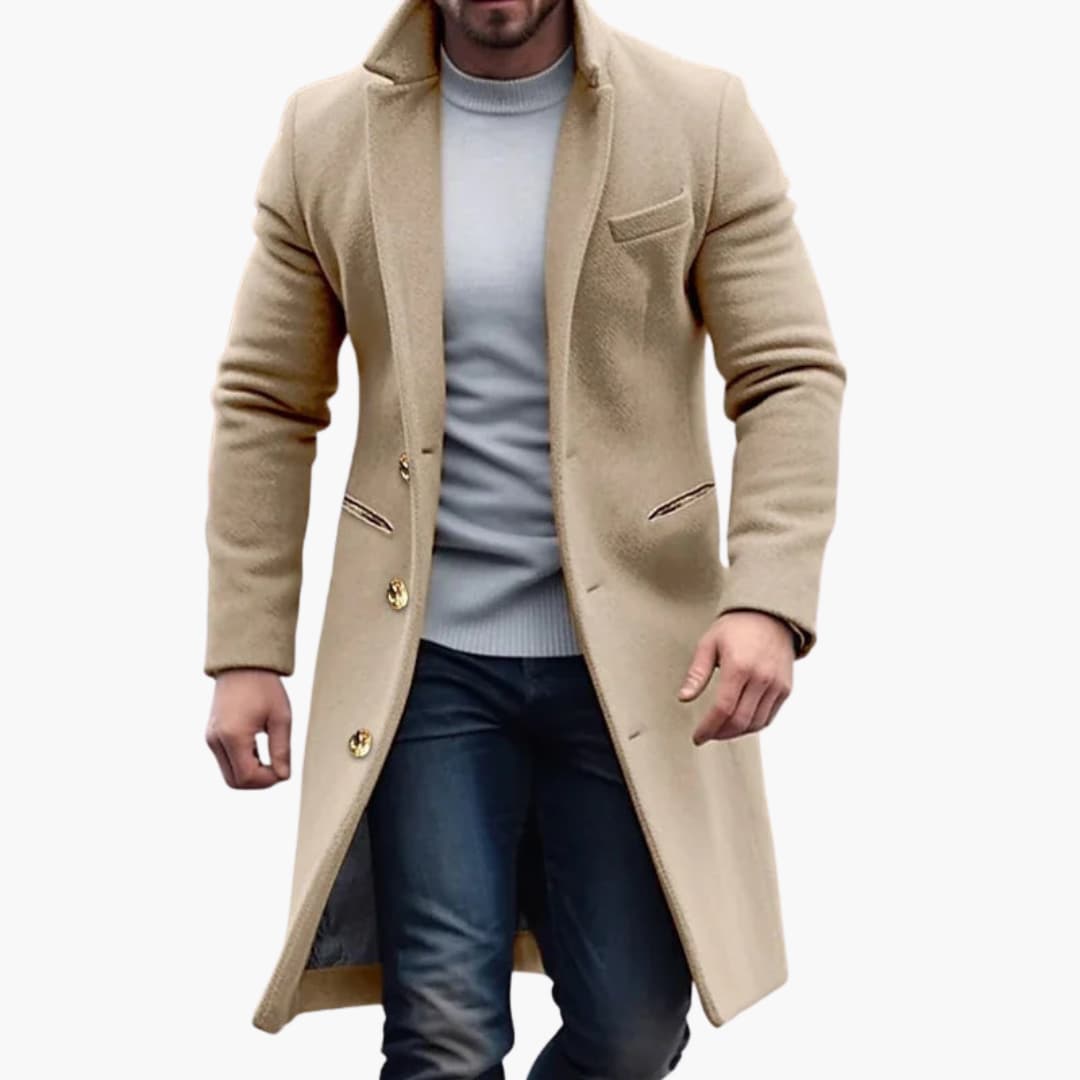 Men's long coat by Wilfred Smith in beige with notched lapel and front button closure, formal outerwear.