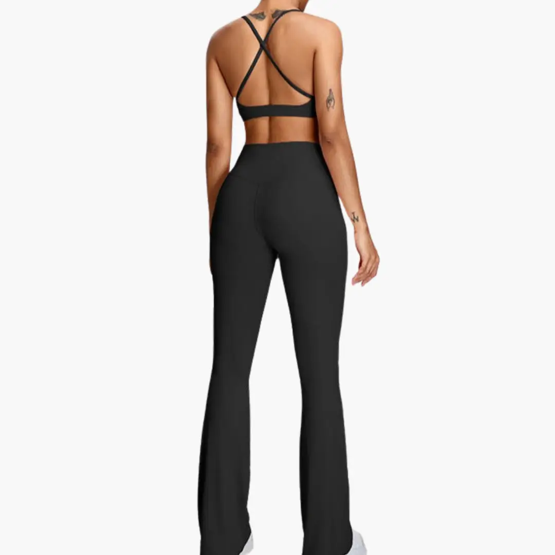 Women's black high-waist yoga pants with tummy control, back view; Wilfred Smith.