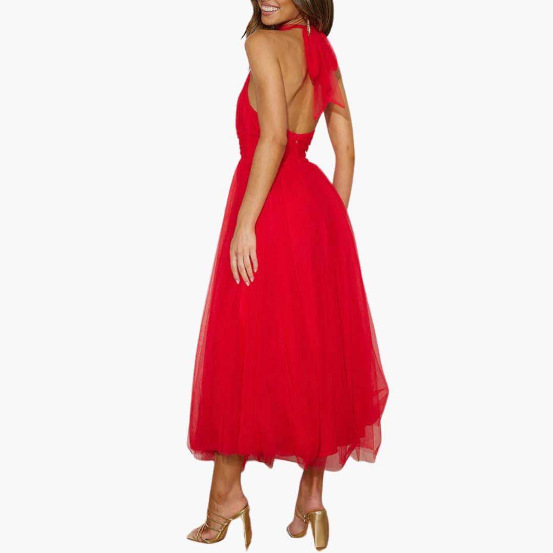 Red tulle halter-neck midi dress by Wilfred Smith, elegant party dress with open back and full skirt.