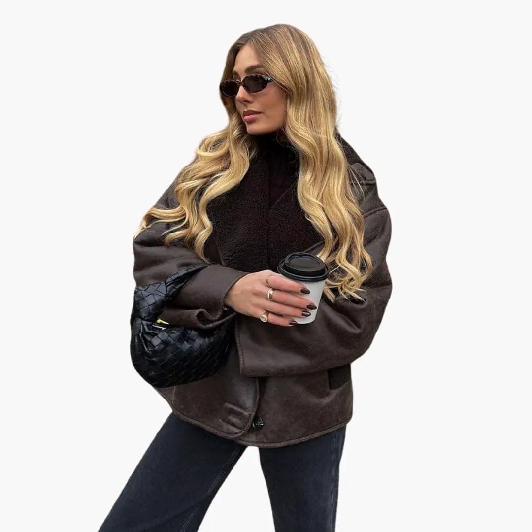 Women's brown leather jacket, elegant long-sleeve design with warm shearling lining