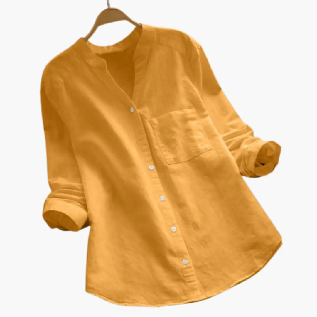 Loose-fitting blouse by Wilfred Smith, long sleeves, stand-up collar, mustard color, chest pocket