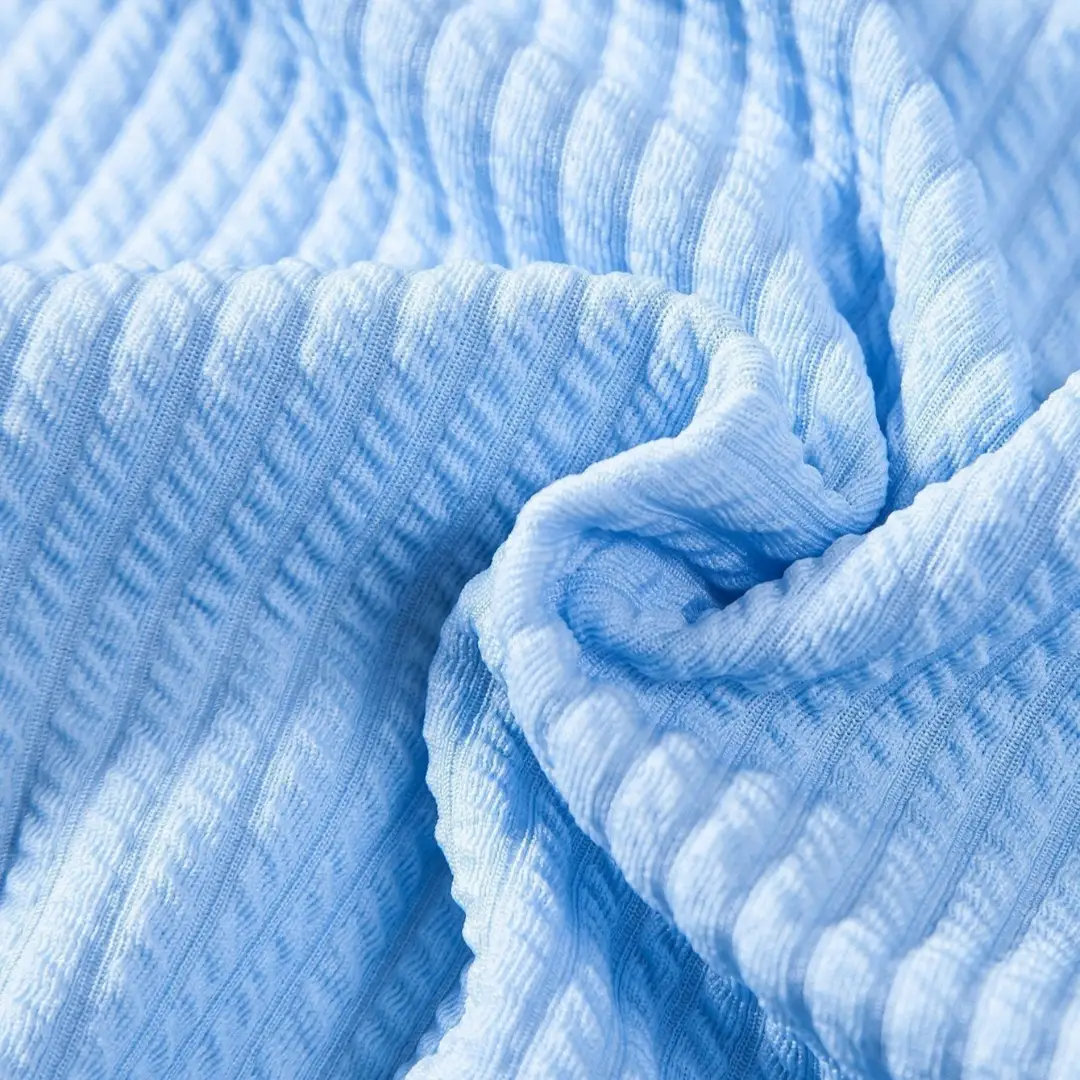 Men's shirt fabric in light blue ribbed texture
