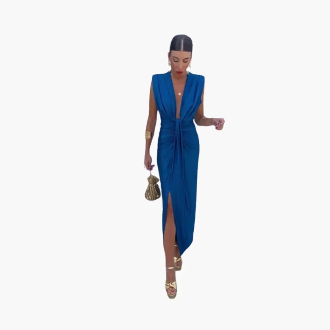 Elegant pleated maxi dress in royal blue with plunging neckline, ruched waist, and front slit.