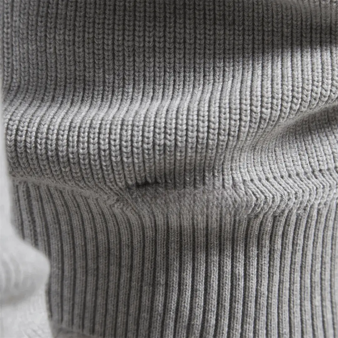 Knitted men's pullover sweater in gray with ribbed texture.