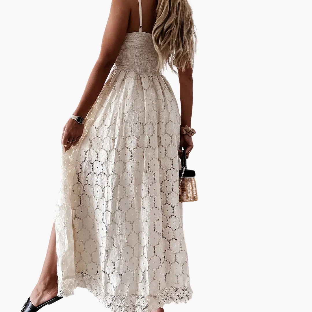 Ivory lace jumpsuit for women with a smocked bodice and scalloped hem.