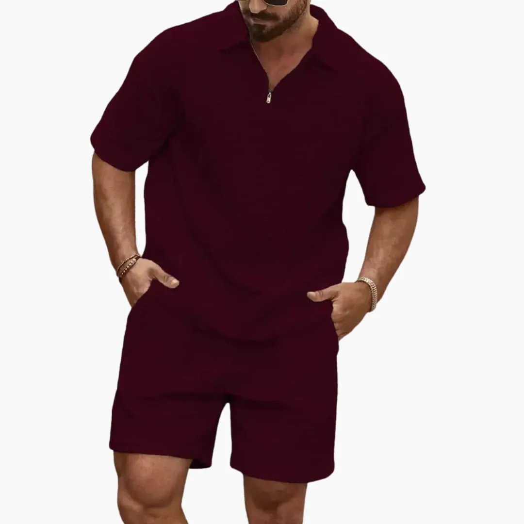Men's two-piece burgundy set with quilted structure, half-zip top and matching shorts