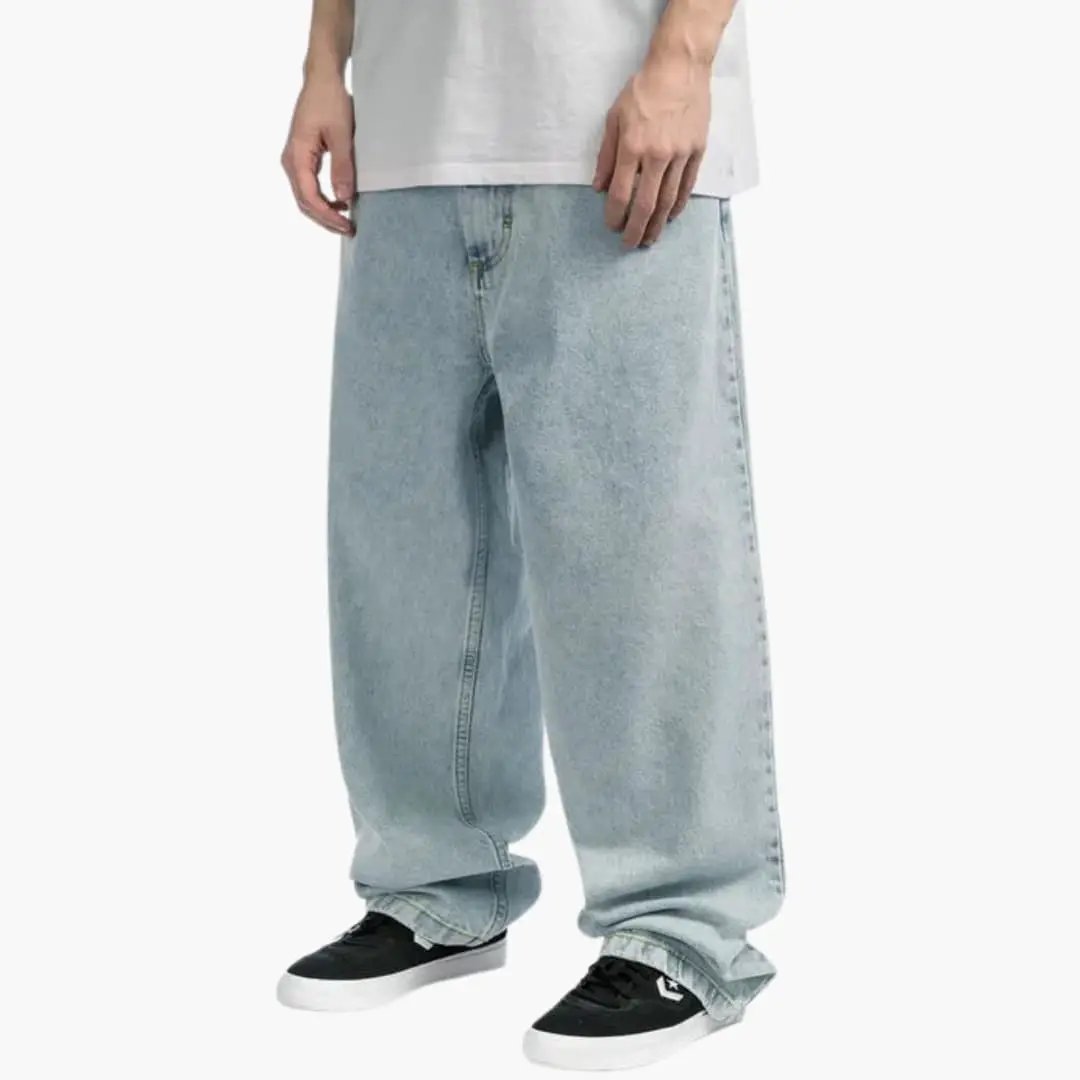 Loose baggy jeans for men, light-wash denim in urban street style by Wilfred Smith