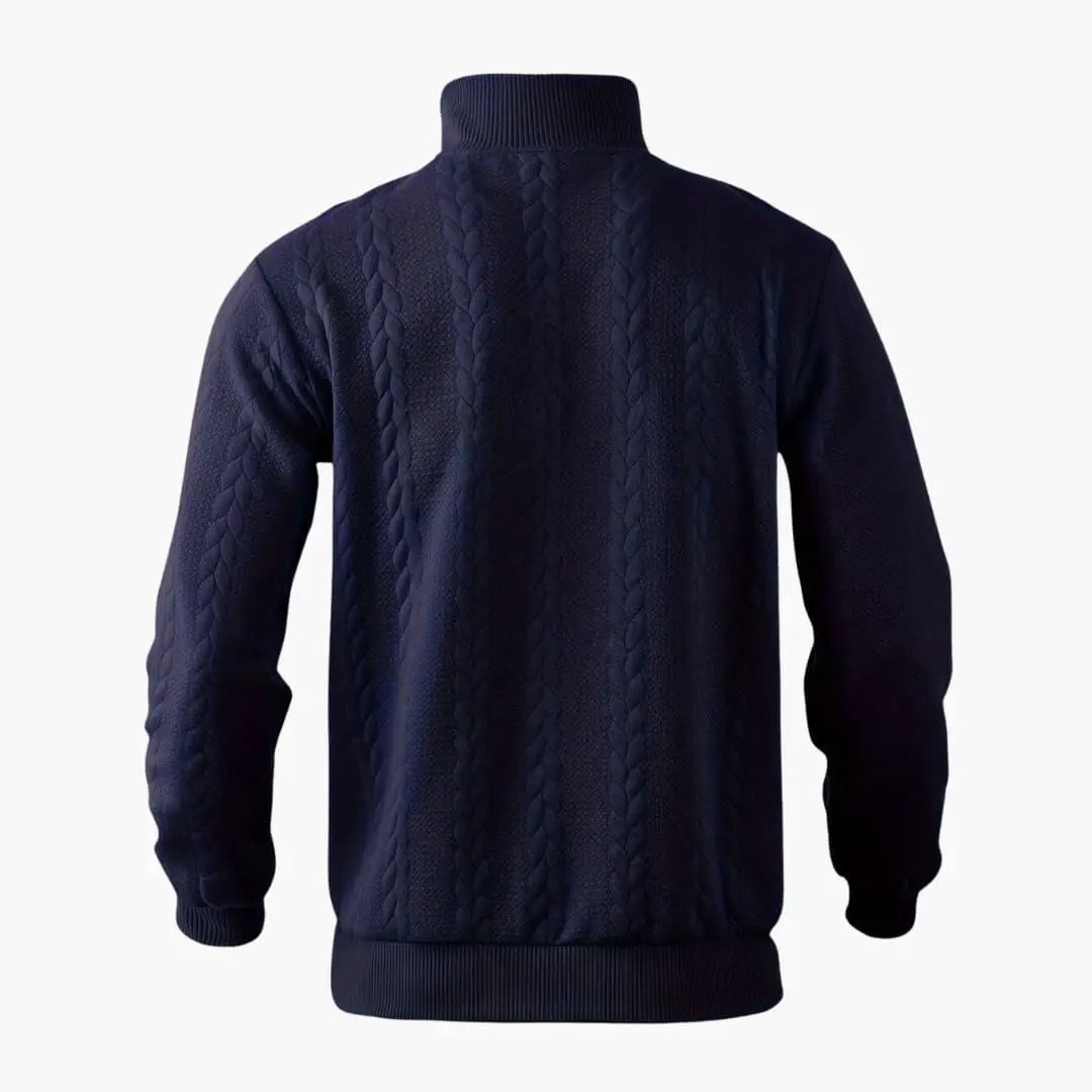 Men's half-zip navy pullover sweater by Wilfred Smith with cable-knit texture and ribbed collar and cuffs.