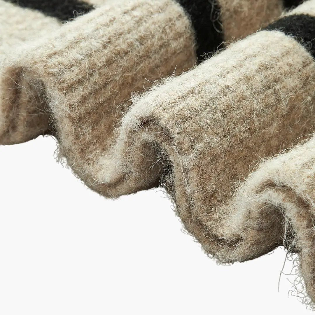 Women's oversized striped pullover sweater with fuzzy beige knit and black stripes