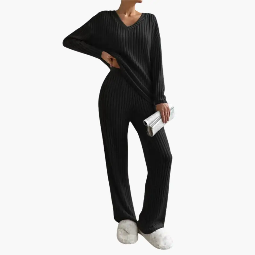 Two-piece black ribbed knit loungewear set with V-neck top and matching pants