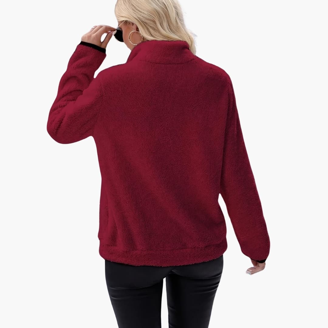 Women's fleece pullover with half-zip, burgundy, back view showing soft textured fabric