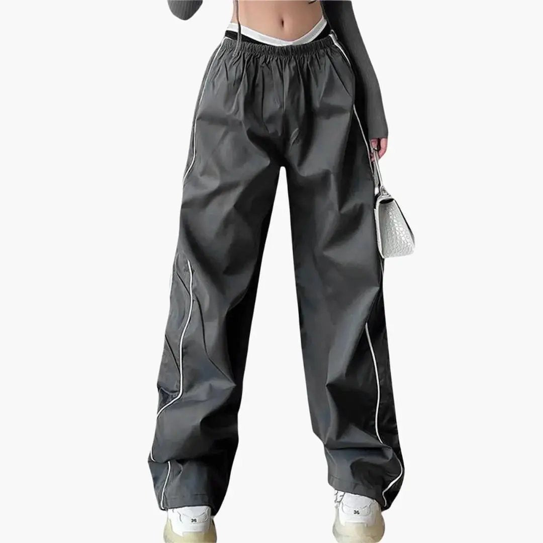 Women's baggy joggers with side white stripes and elastic waist in dark gray