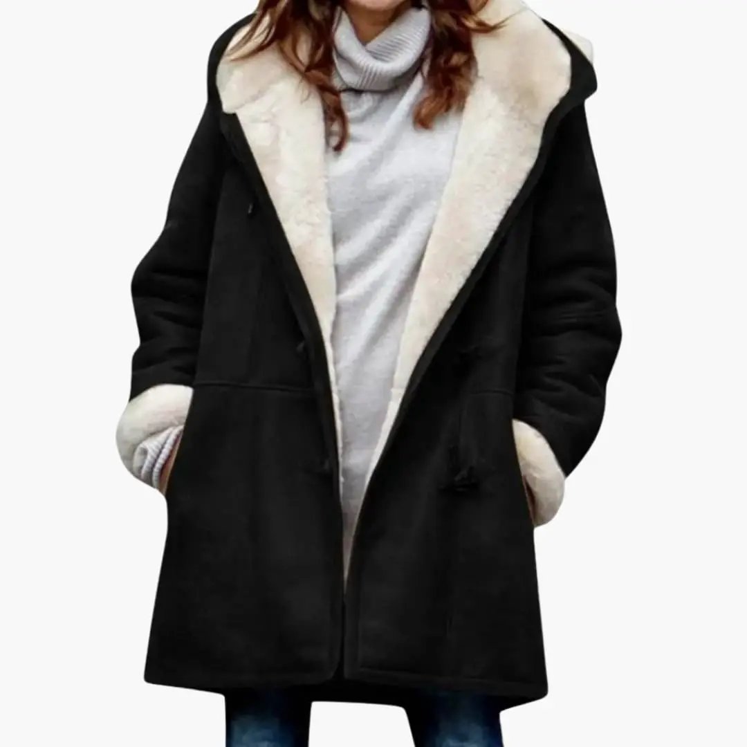 Women's Coat with Toggle Closure, black overcoat with cream shearling lining by Wilfred Smith.