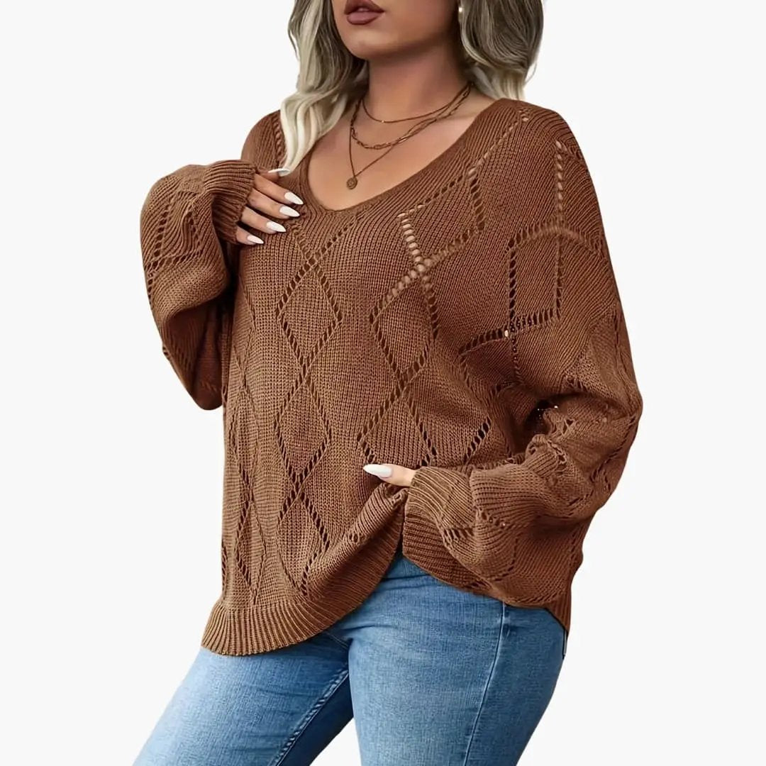 Women's oversized brown knit sweater with a diamond pattern, round neck, and long sleeves.