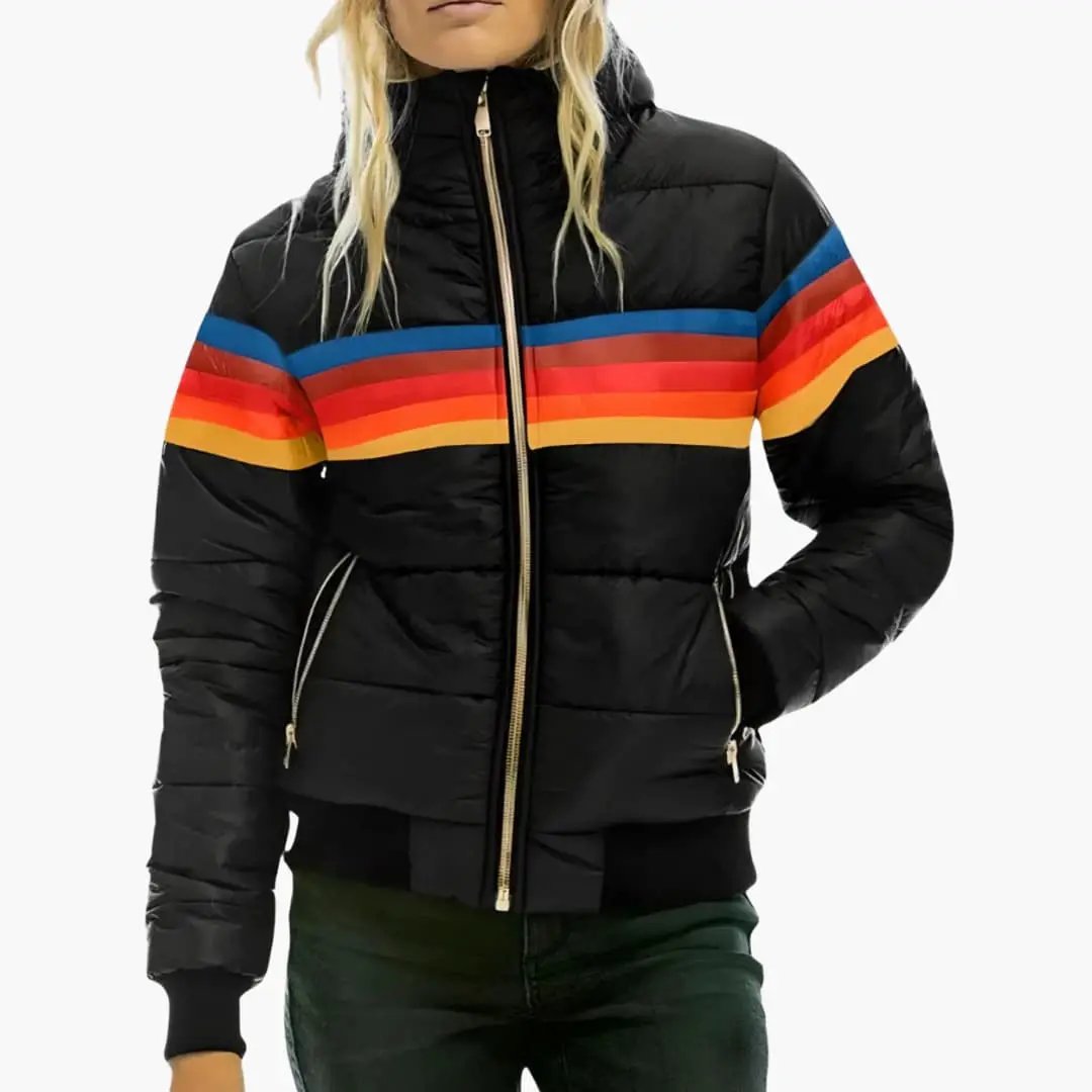 Wilfred Smith women's padded jacket with hood, black puffer with rainbow chest stripe and gold zipper.