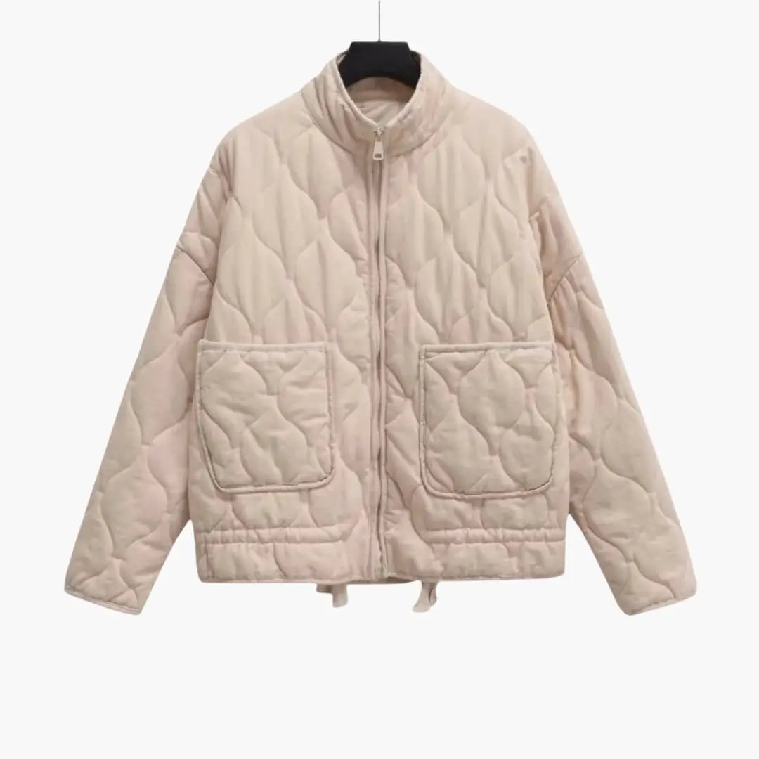 Women's beige quilted jacket with zip front and two patch pockets