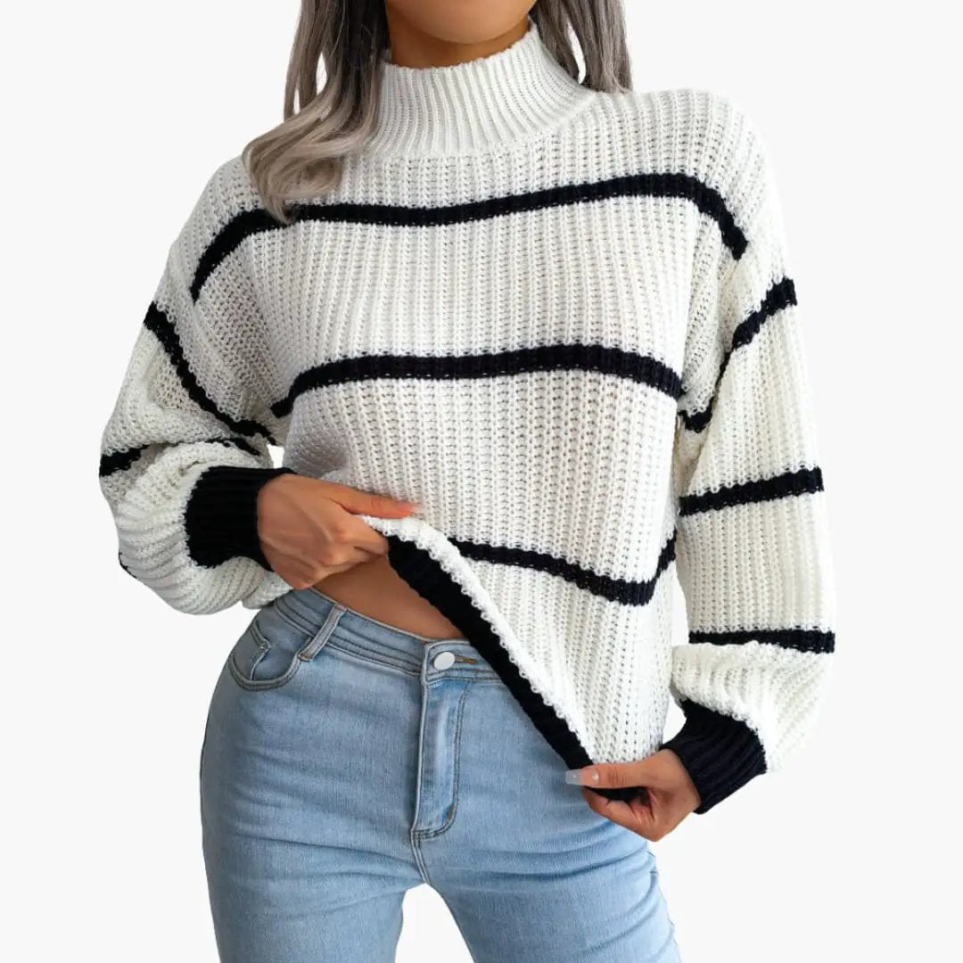 Women's knit sweater with black stripes on white, high collar, chunky knit texture