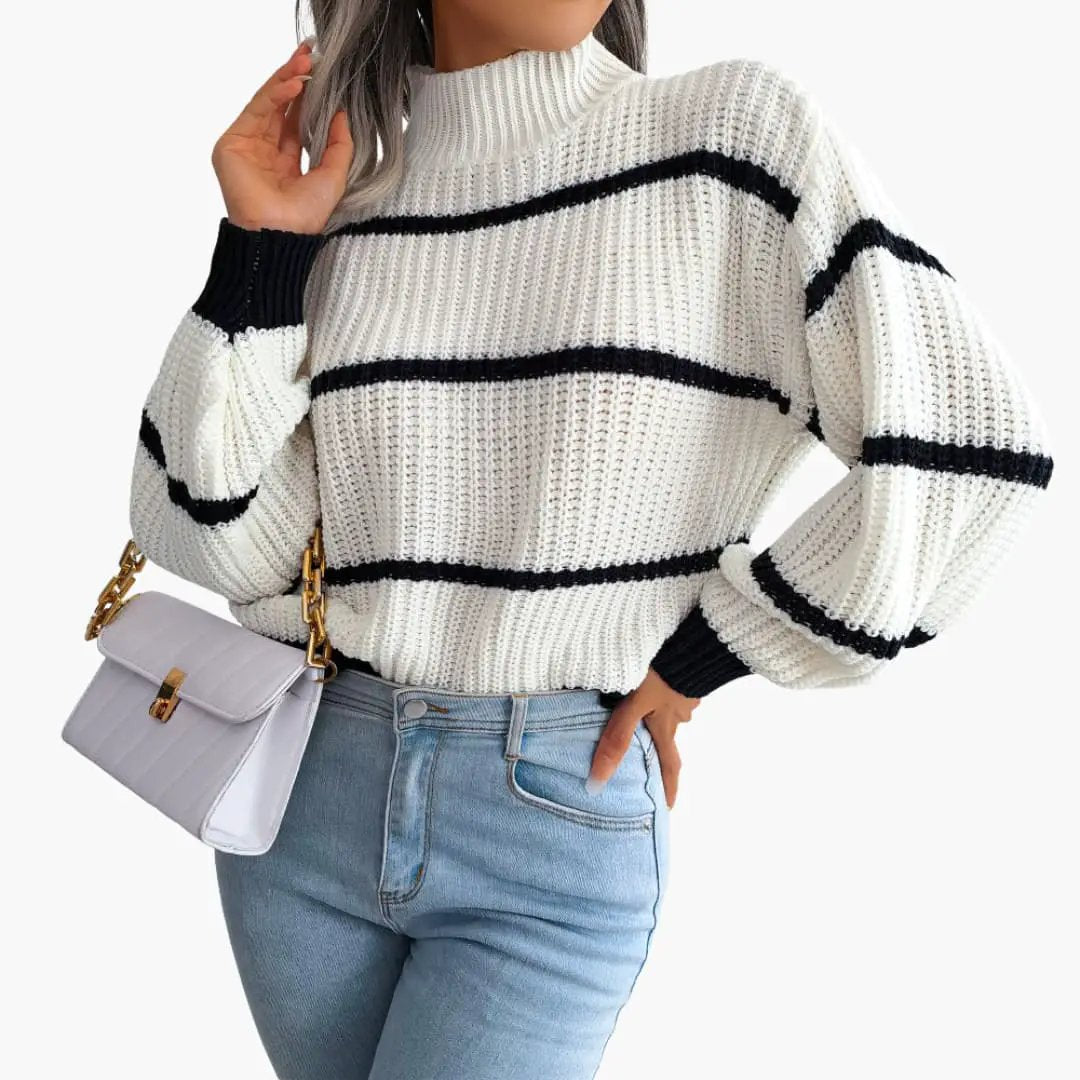 Women's knit sweater with stripes and high collar; white with black bands