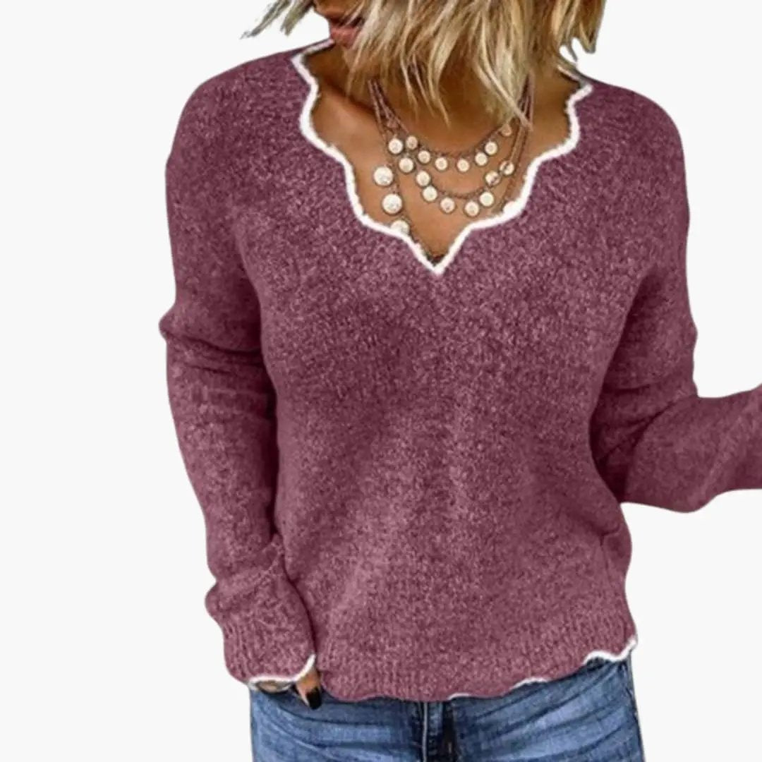 Women's knit sweater with wavy edge in plum with white neckline trim
