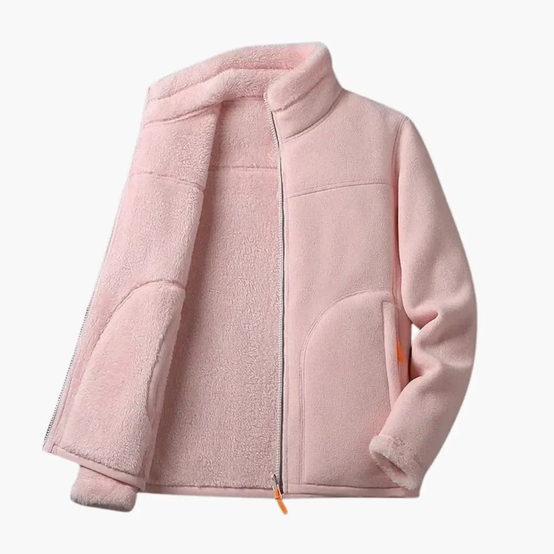 Pink women's fleece jacket with zipper and pockets, featuring a plush sherpa-like lining for warmth.