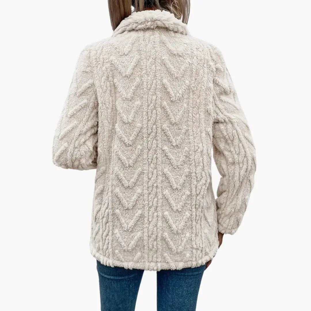 Women's cream faux-shearling jacket with textured chevron pattern, back view