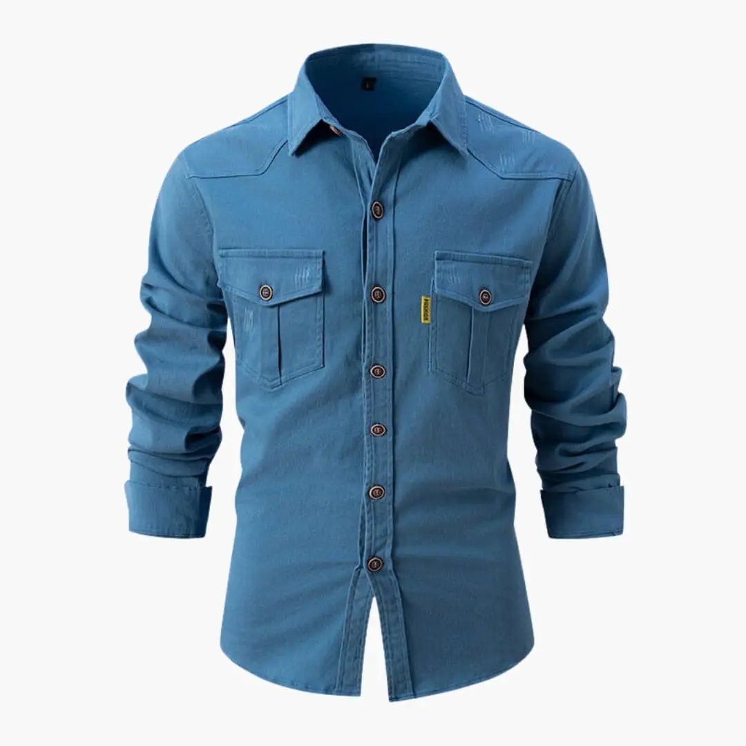 Men's shirt by Wilfred Smith, blue long-sleeve with button placket and two chest pockets.