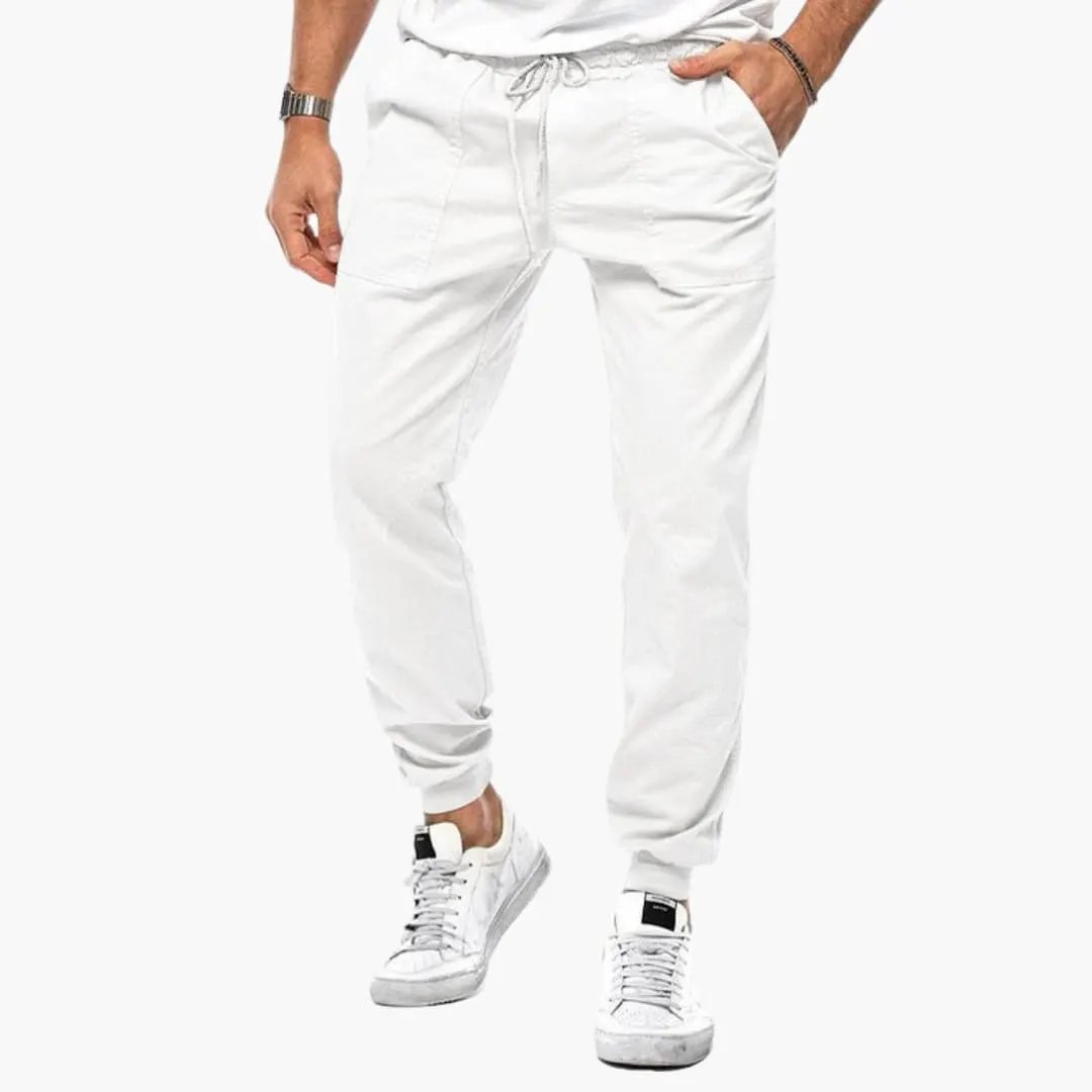Men's jogging pants with elastic waistband, white joggers with drawstring and cuffed ankles