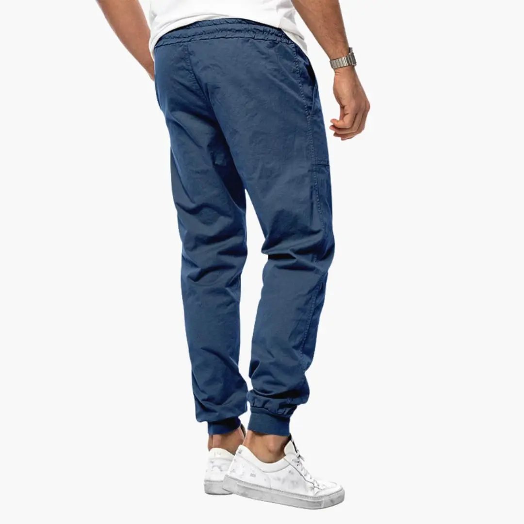 Men's Jogging Pants by Wilfred Smith in blue with elastic waistband and cuffed ankles