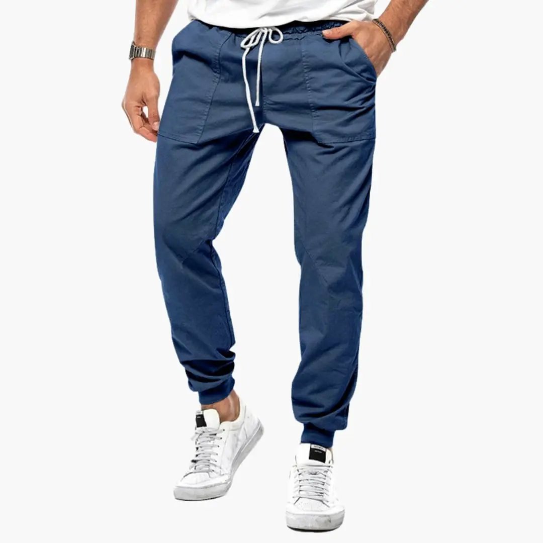 Men's Jogging Pants with Elastic Waistband by Wilfred Smith, blue joggers with drawstring and cuffed ankles.