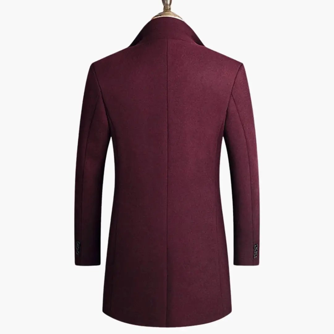 Men's burgundy long coat with button closure by Wilfred Smith, back view