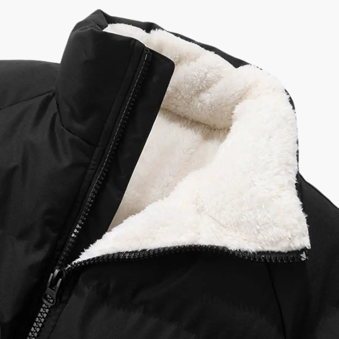Men’s Quilted Jacket with Zipper, black exterior and white fleece lining.