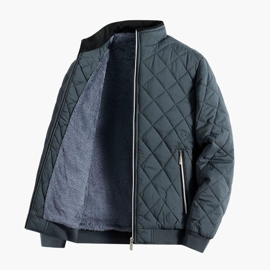 Men's quilted puffer jacket with stand-up collar and zipper by Wilfred Smith, dark teal with plush fleece lining.