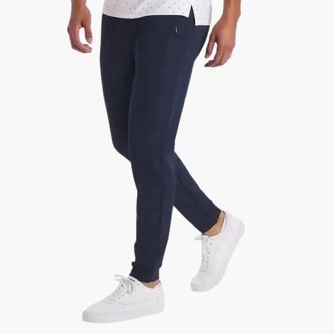 Men's navy tapered trousers with stretch waistband by Wilfred Smith.