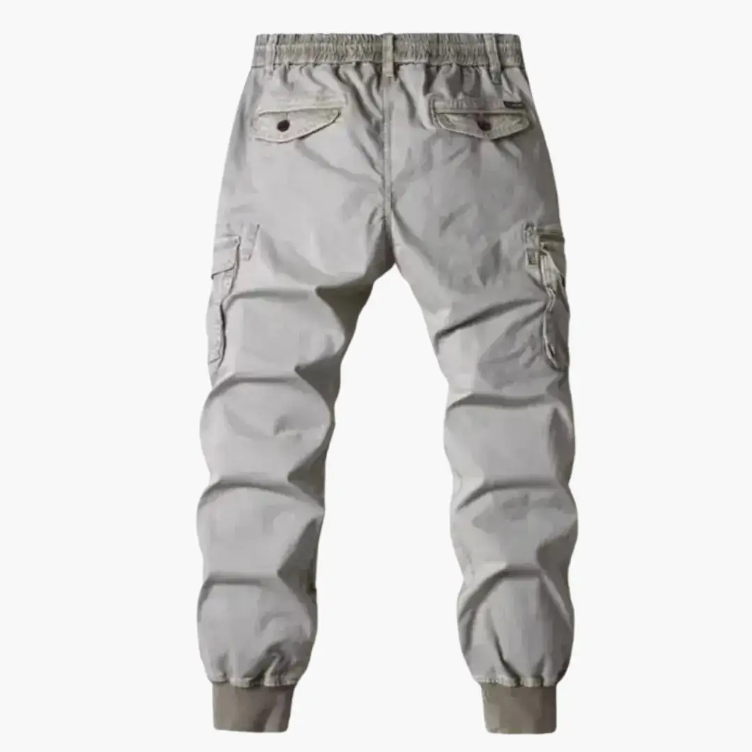 Wilfred Smith men's cargo trousers with drawstring waist, light gray, back flap pockets, side cargo pockets.