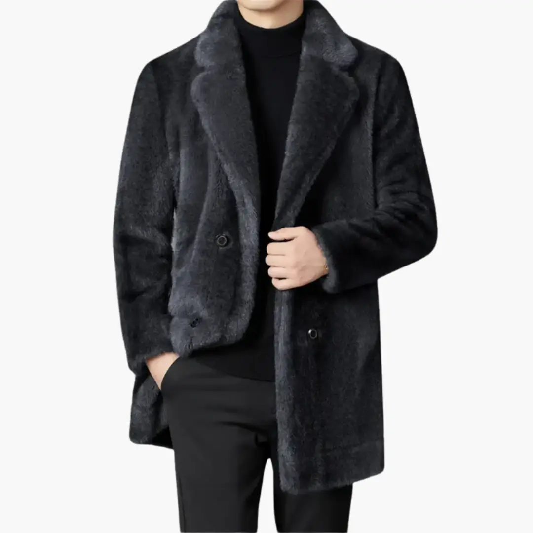 Men’s faux fur coat by Wilfred Smith with lapel collar, button front, and mid-length silhouette in dark gray.