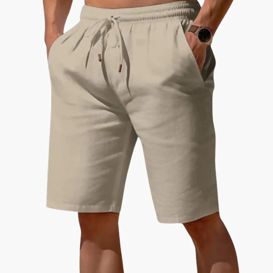 Men's linen jogger shorts with elastic waistband and drawstring in beige, Wilfred Smith.