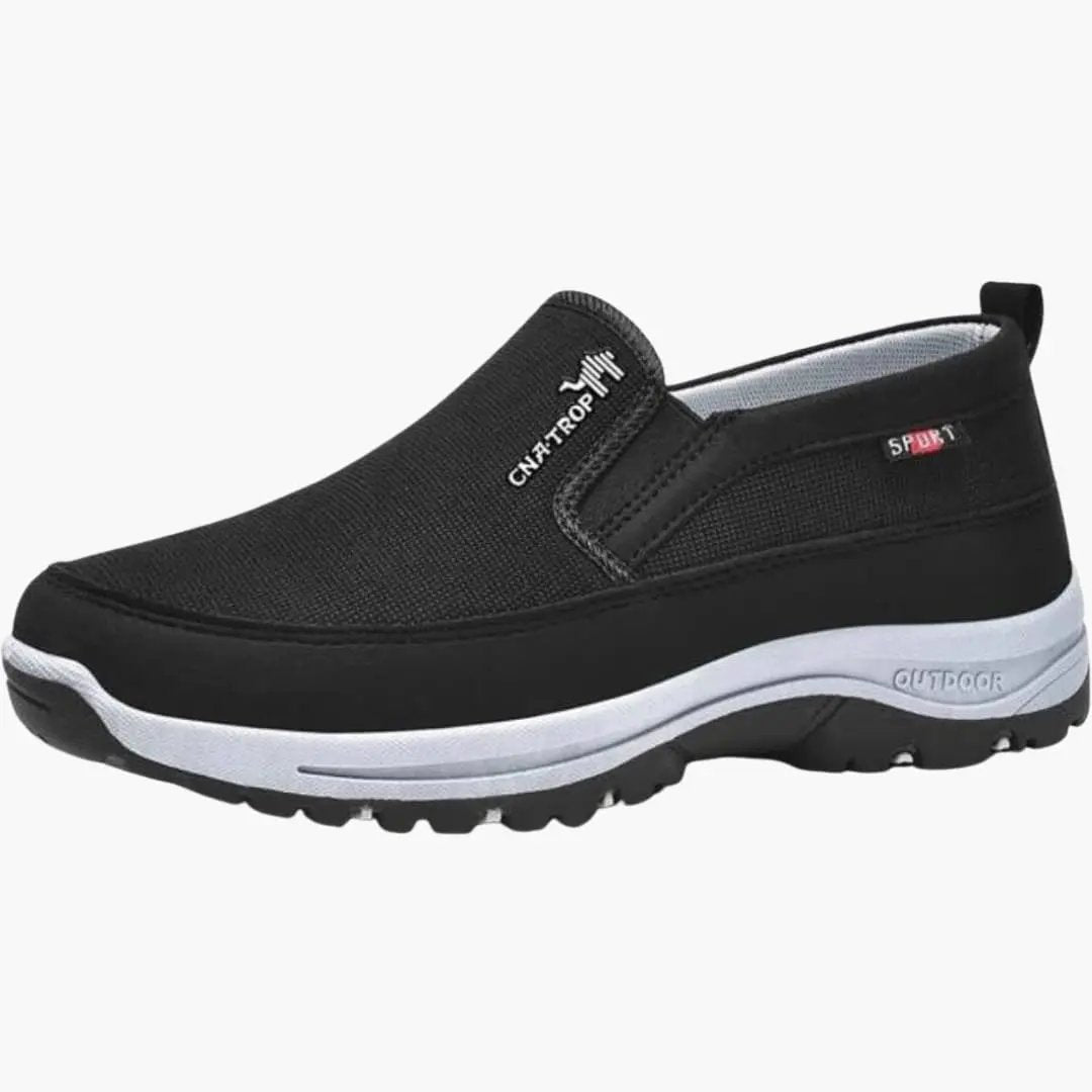 Men's orthopedic athletic shoe with air-cushion sole, black fabric upper, lace closure, Wilfred Smith.