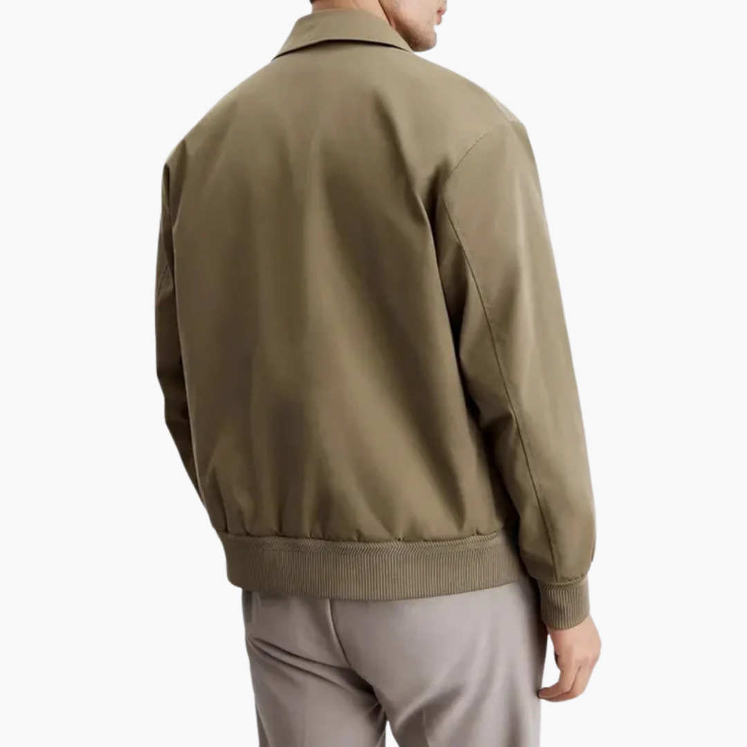 Men's tan overcoat with pointed collar, back view and ribbed hem/cuffs