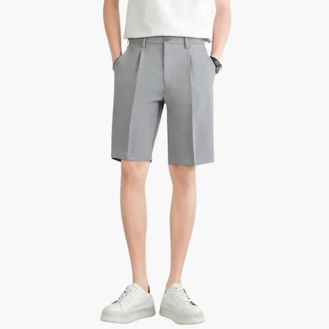 Men's Pleated Chino Shorts by Wilfred Smith, gray knee-length with zipper and belt loops