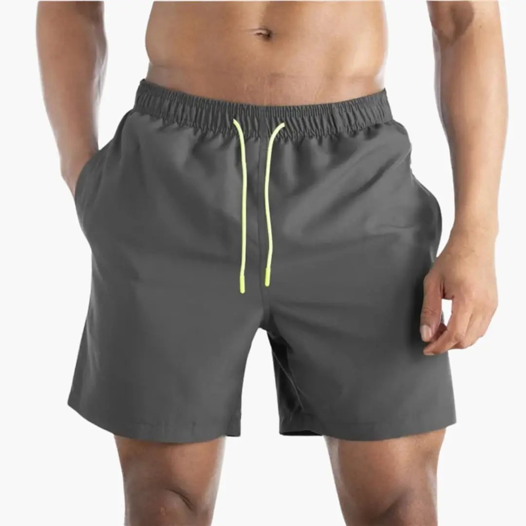 Men’s Jogger Shorts in gray with elastic waistband, neon-yellow drawstring, and stretch fabric